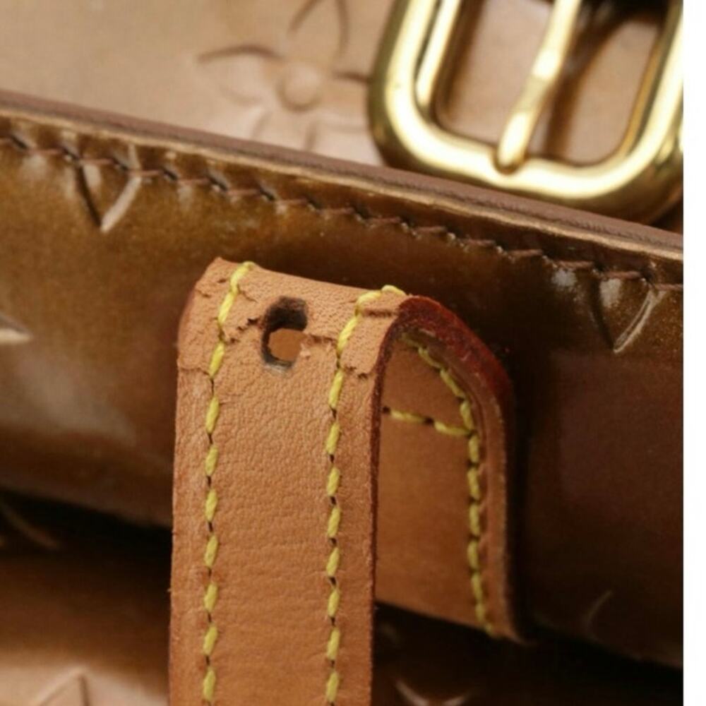 Authenticated Louis Vuitton Christie MM Crossbody in Bronze - Picture 10 of 10